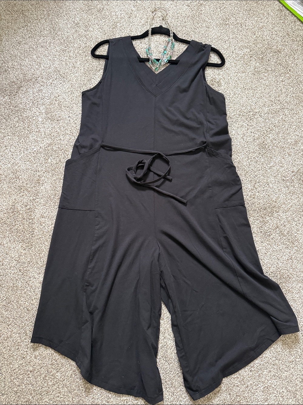 Sleeveless Black V-Neck Wide-Leg Jumpsuit with Waist Tie